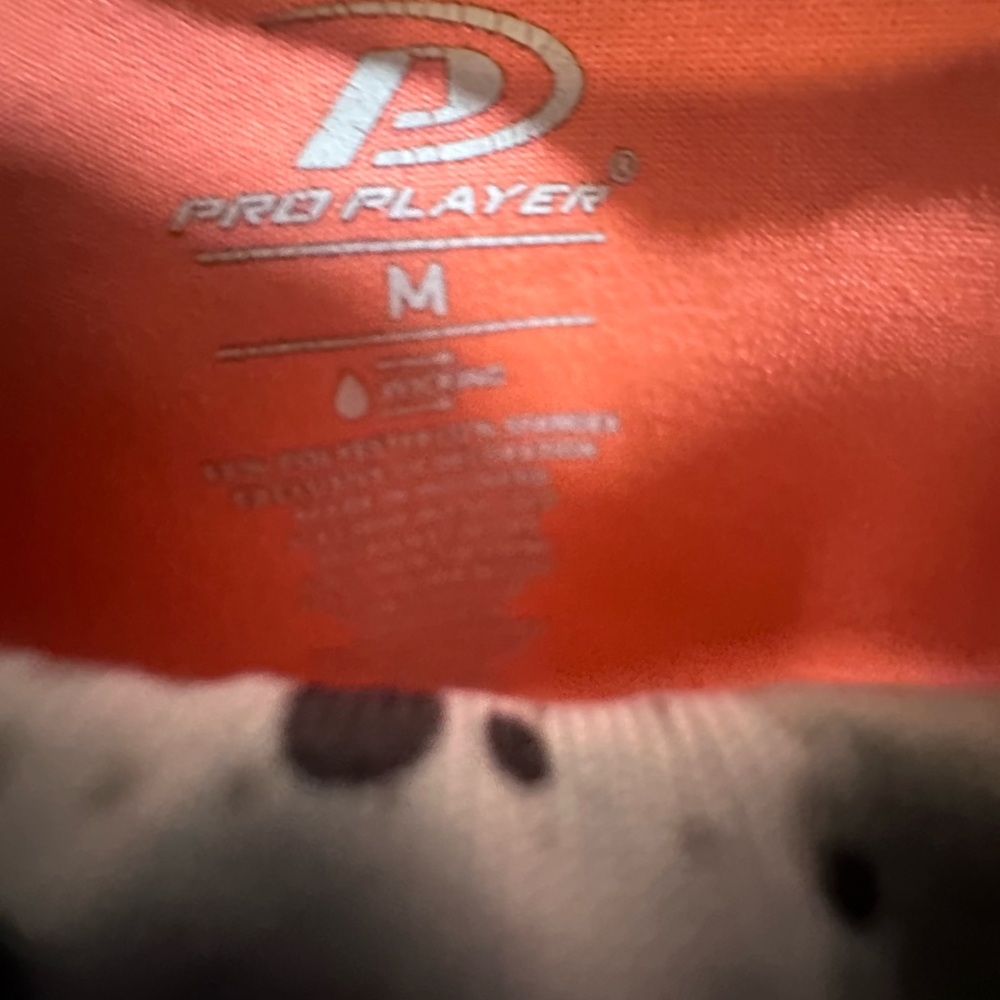 Pro Player Orange and Black Apparel